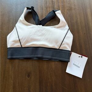 Elegant Rumble Brand Cream and Black Sports Bra w/ Jab logo